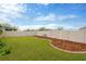 Landscaped backyard offers plenty of green space at 8529 Hunters Fork Loop, Ruskin, FL 33573