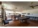 Spacious game room with billiard tables, exercise equipment, and seating, perfect for recreation and relaxation at 8555 112Th St # 209, Seminole, FL 33772