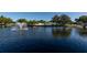 Picturesque pond with a fountain, offering a tranquil and scenic environment at 8555 112Th St # 209, Seminole, FL 33772