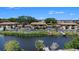 Waterfront condos featuring docks, manicured landscaping, and assigned parking at 10216 Seminole Island Dr, Largo, FL 33773