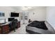 This bedroom features natural lighting, carpeting, and functional desk area at 10216 Seminole Island Dr, Largo, FL 33773