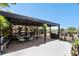 Charming covered patio perfect for outdoor dining and relaxation at 10216 Seminole Island Dr, Largo, FL 33773