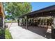 Relaxing covered patio with lush greenery and ample seating area at 10216 Seminole Island Dr, Largo, FL 33773