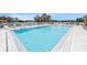 Sparkling community pool with clear blue water, perfect for swimming laps or simply relaxing on a sunny day at 10216 Seminole Island Dr, Largo, FL 33773