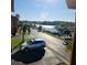 Street view overlooking the waterfront, highlighting the property's prime location with water access at 10216 Seminole Island Dr, Largo, FL 33773