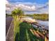 Waterfront with boat and dock. Perfect for watersports and relaxation at 10216 Seminole Island Dr, Largo, FL 33773