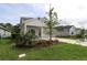 Charming home with landscaped yard, stone accents, and long driveway at 11884 Richmond Trl, Parrish, FL 34219
