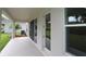 Covered porch view with multiple windows allowing natural light at 11884 Richmond Trl, Parrish, FL 34219