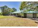 Community playground with a covered picnic pavilion, perfect for families to gather and enjoy outdoor activities at 1201 Montrose Pl, Dunedin, FL 34698