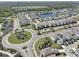 A Primary-planned community featuring beautiful landscaping, multiple ponds, and attractive roundabout at 12421 Triple Creek Blvd, Riverview, FL 33579