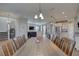Spacious dining area with seating for eight, seamlessly connecting to the kitchen and living areas at 12421 Triple Creek Blvd, Riverview, FL 33579