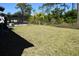 Wide open backyard with screen patio to enjoy the outdoors at 12957 Wildflower Meadow Dr, Riverview, FL 33579