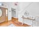 Inviting foyer features beautiful wood floors and staircase at 13122 Prestwick Dr, Riverview, FL 33579