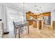 Spacious kitchen featuring granite countertops, stainless steel appliances, and a large dining area at 13122 Prestwick Dr, Riverview, FL 33579