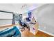Well-lit office space featuring hardwood floors, neutral walls, and modern track lighting, perfect for a productive work environment at 13122 Prestwick Dr, Riverview, FL 33579