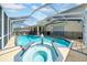 A private pool and integrated spa provide outdoor entertainment and enjoyment at 13122 Prestwick Dr, Riverview, FL 33579
