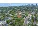 Aerial view of a property surrounded by lush greenery with a cityscape in the background, showcasing its prime location at 138 17Th N Ave, St Petersburg, FL 33704