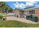 The home features a brick patio and an outdoor kitchen area at 138 17Th N Ave, St Petersburg, FL 33704