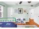 Bright bedroom with natural light, colorful artwork, and a playful aesthetic making it a comfortable space at 138 17Th N Ave, St Petersburg, FL 33704