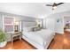 Bright bedroom boasts a king bed, vaulted ceilings, and hardwood floors at 138 17Th N Ave, St Petersburg, FL 33704