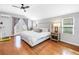 Charming bedroom with a king bed, wood floors, and natural light at 138 17Th N Ave, St Petersburg, FL 33704