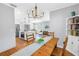 Open concept dining room that flows to kitchen with island cooktop and living room, great for entertaining at 138 17Th N Ave, St Petersburg, FL 33704