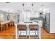 Modern kitchen showcasing white cabinets, stainless steel appliances, and eat-in island at 138 17Th N Ave, St Petersburg, FL 33704