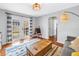 Bright and airy living room with wood floors, a patterned rug, and a walk out to a patio at 138 17Th N Ave, St Petersburg, FL 33704