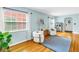Bright living room featuring hardwood floors, modern furniture, and plenty of natural light at 138 17Th N Ave, St Petersburg, FL 33704