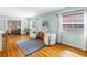 Bright living room featuring hardwood floors, modern furniture, and plenty of natural light at 138 17Th N Ave, St Petersburg, FL 33704