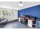 Well lit office with modern desk, dual monitors, stylish chair, and view to the backyard at 138 17Th N Ave, St Petersburg, FL 33704