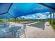 Bocce ball court with shade and seating perfect for a relaxing game at 14221 Eagle Branch Dr, Nokomis, FL 34275