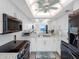 Bright kitchen with white cabinets, modern appliances and island with lots of natural light at 1430 Gulf Blvd # 309, Clearwater Beach, FL 33767