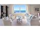 Inviting living room features comfortable seating and a scenic ocean view at 1430 Gulf Blvd # 309, Clearwater Beach, FL 33767