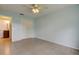 This bedroom features neutral walls, tiled floors, and a closet with bi-fold doors at 1466 Normandy Park Dr # 4, Clearwater, FL 33756