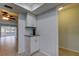 Additional kitchen cabinetry with granite countertops, conveniently located near doorway to living space at 1466 Normandy Park Dr # 4, Clearwater, FL 33756