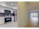 Modern kitchen boasts stainless steel appliances, subway tile backsplash, white cabinets, and easy access to the living area at 1466 Normandy Park Dr # 4, Clearwater, FL 33756