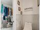 Bathroom featuring a modern toilet and storage at 151 Harrisburg St, Port Charlotte, FL 33954