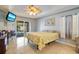 Bedroom featuring sliding glass doors to the patio and an ensuite bathroom at 151 Harrisburg St, Port Charlotte, FL 33954
