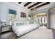 Elegant main bedroom with a sitting area and large windows that brings in the natural light at 17221 Breeders Cup Dr, Odessa, FL 33556
