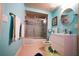 Bathroom with glass enclosed shower and modern vanity at 1860 N Fort Harrison Ave # 301, Clearwater, FL 33755