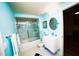 Bathroom with glass enclosed shower and modern vanity at 1860 N Fort Harrison Ave # 301, Clearwater, FL 33755