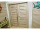 Charming entryway with artistic decor, modern closet doors, and stylish accents at 1860 N Fort Harrison Ave # 301, Clearwater, FL 33755