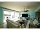 A bright living room with water views, ample seating, and contemporary design at 1860 N Fort Harrison Ave # 301, Clearwater, FL 33755