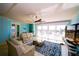 Bright, open living and dining room with ocean view and modern decor with adjoining kitchen and dining areas at 1860 N Fort Harrison Ave # 301, Clearwater, FL 33755
