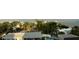 Scenic neighborhood view featuring lush greenery, charming homes, and waterfront views of the bay at 1860 N Fort Harrison Ave # 301, Clearwater, FL 33755