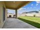 View of the backyard, patio, BBQ grill, AC unit and privacy fence at 22229 Storybook Cabin Way, Land O Lakes, FL 34637