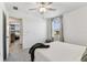 This well-lit bedroom includes a large window and comfortable carpet, providing a bright and relaxing space at 22229 Storybook Cabin Way, Land O Lakes, FL 34637