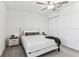 This comfortable bedroom has a soft carpet, modern bed, stylish nightstand, and closet, perfect for relaxation at 22229 Storybook Cabin Way, Land O Lakes, FL 34637