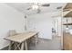 Bright office space featuring a minimalist design, a desk, and a comfortable chair for a productive work environment at 22229 Storybook Cabin Way, Land O Lakes, FL 34637